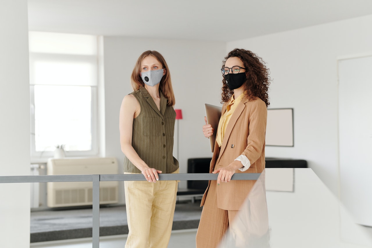 women wearing masks at the office