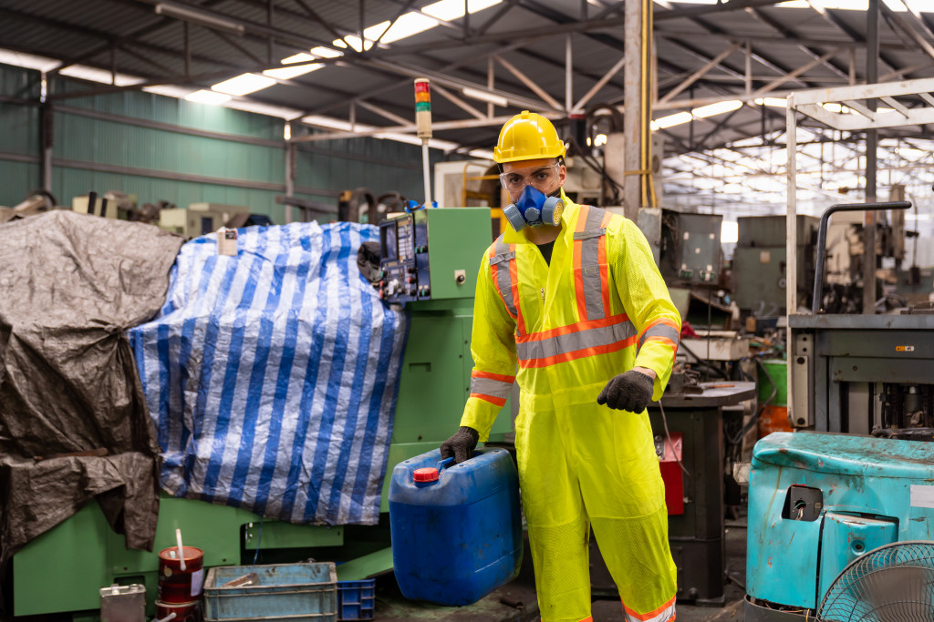 A manufacturing worker in hazardous conditions