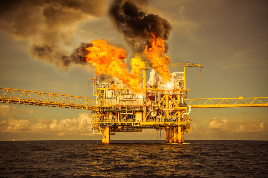 An off-shore oil rig on fire